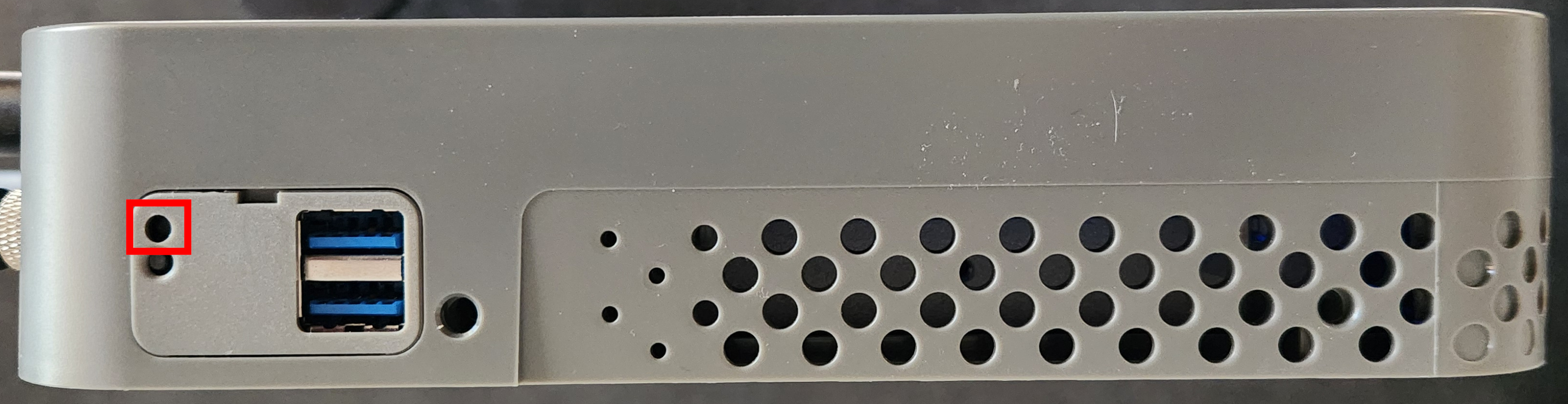 Left side of the XG ESD with the factory reset button highlighted